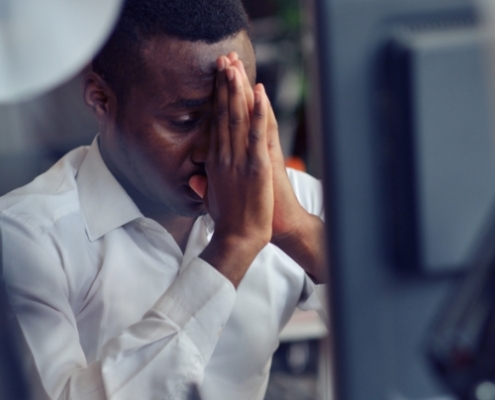 frustrated man on computer